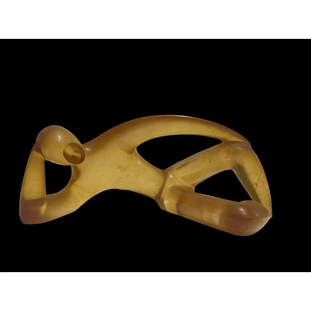 Faceless Lying Down Minimalistic Modern Art StatueYellow Lucite Resin